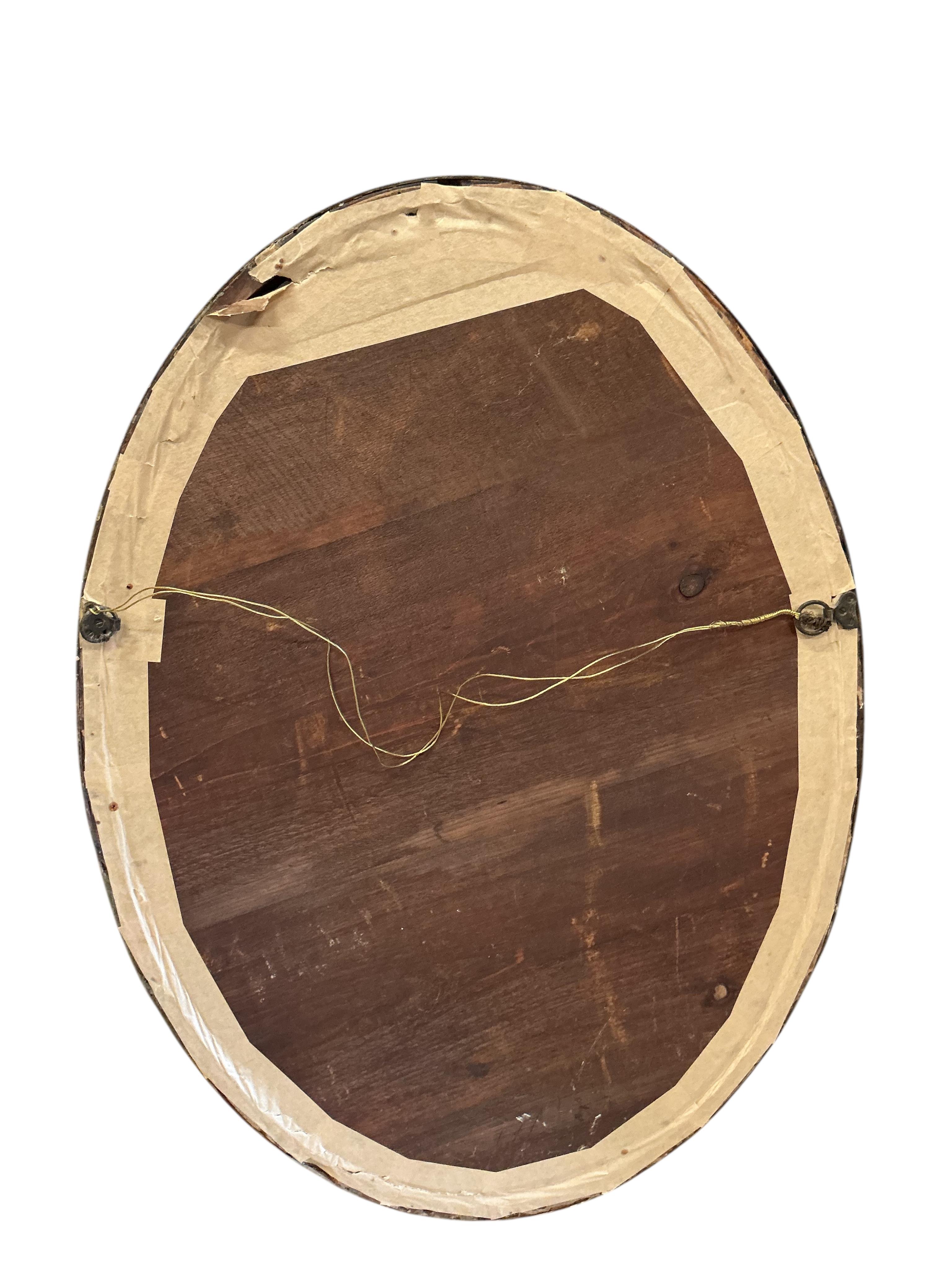 A 19th century oval wall mirror with bead border, width 91cm, height 66cm